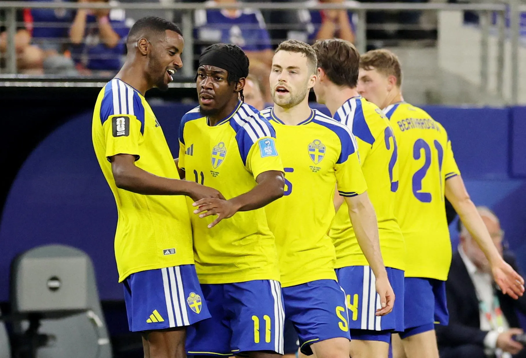 Sweden’s Anthony Elanga celebrates scoring their first goal with Alexander Isak and Gabriel Gudmundsson.