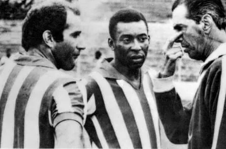 Pelé with Brazil’s coach, João Saldanha, and his teammate Gérson in 1969.