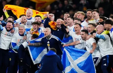 Scotland players celebrate their World Cup qualification Scotland players and manager Steve Clarke celebrate after they qualified for the 2026 World Cup after beating Denmark 4-2