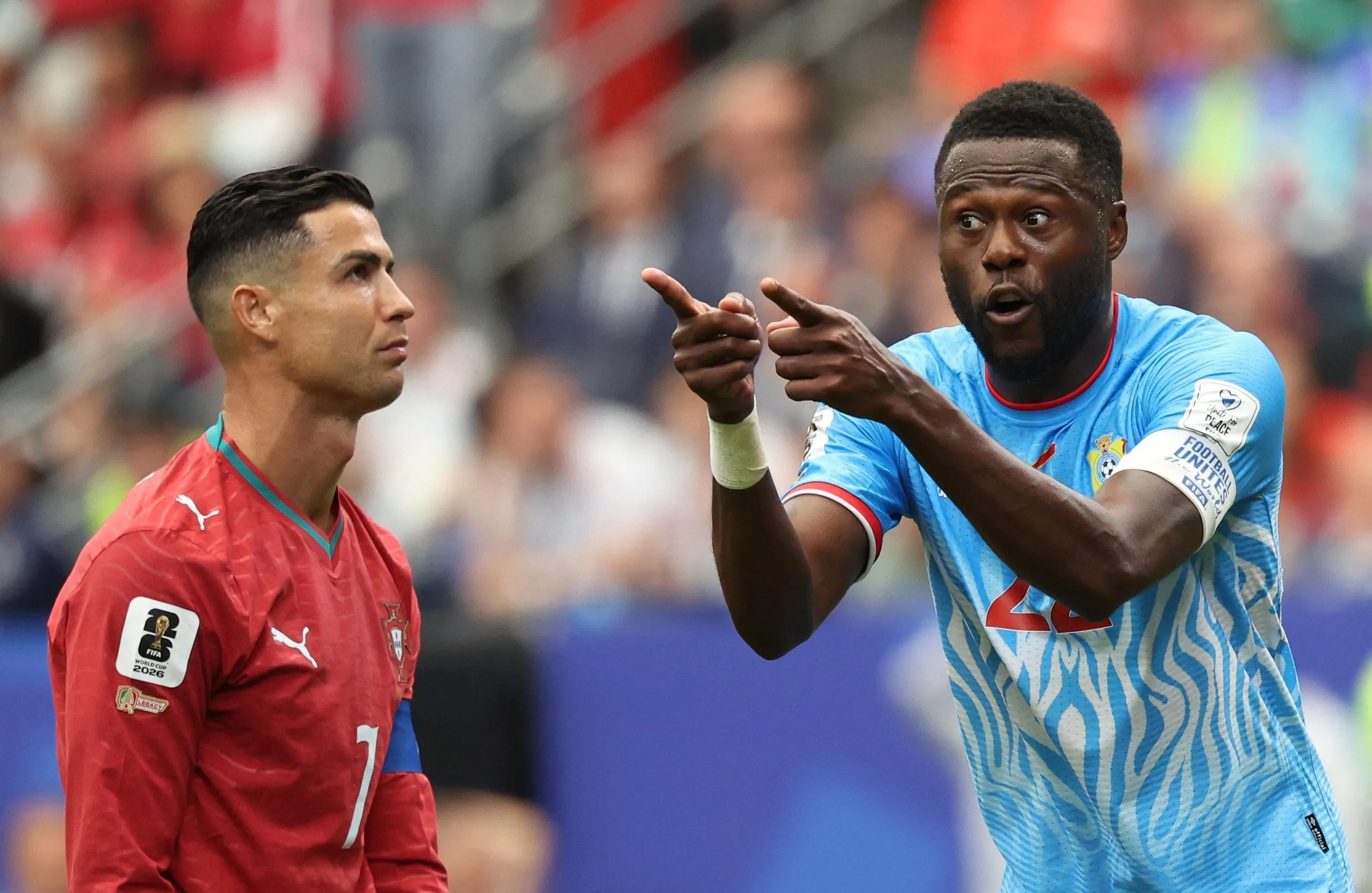 Cristiano Ronaldo and Chancel Mbemba react