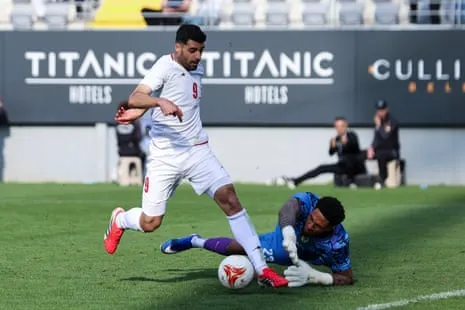 Iran’s Mehdi Taremi (left) attempts to go past Nigeria’s goalkeeper Maduka Okoye during their friendly in March Iran’s Mehdi Taremi (left) attempts to go past Nigeria’s goalkeeper Maduka Okoye during their friendly in March