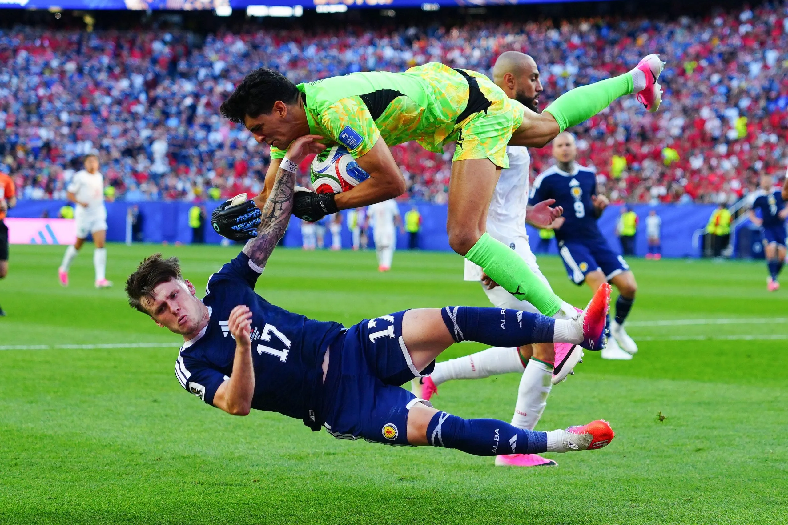 Scotland’s Ben Gannon-Doak collides with Morocco goalkeeper Yassine Bounou