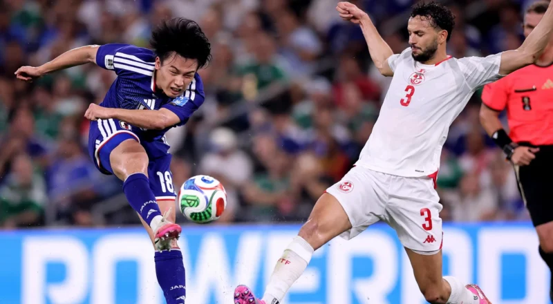 Ueda inspires Japan to eliminate Tunisia in landmark 1,000th World Cup match