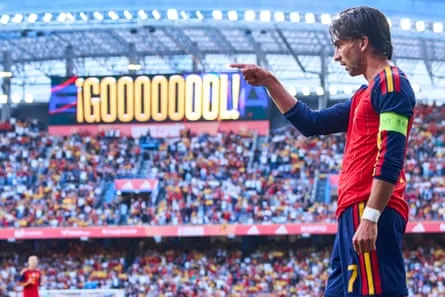 Ferran Torres celebrates after scoring for Spain between Spain against Iraq.