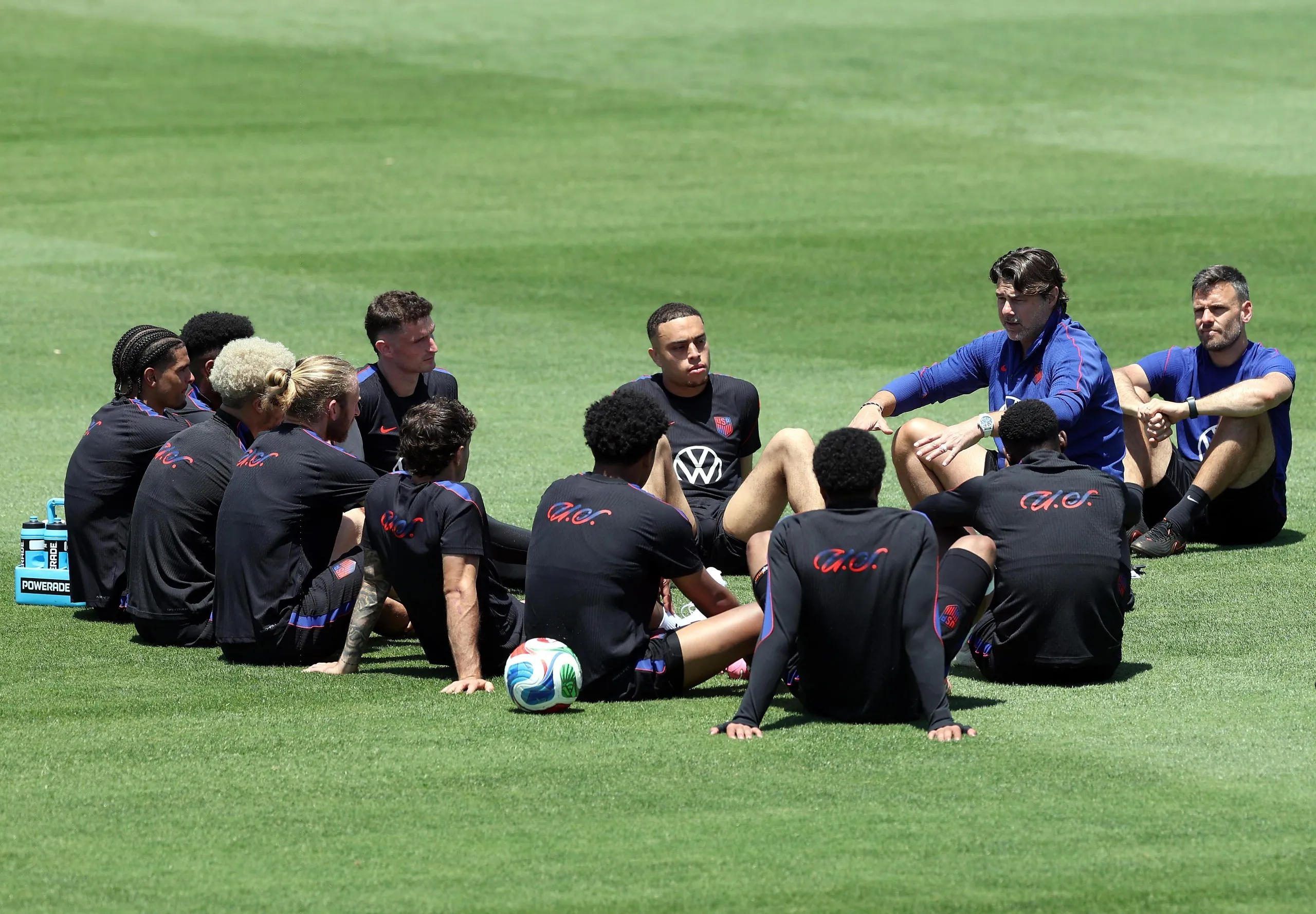 Mauricio Pochettino talks with his USA players during an open practice this month in Irvine, California