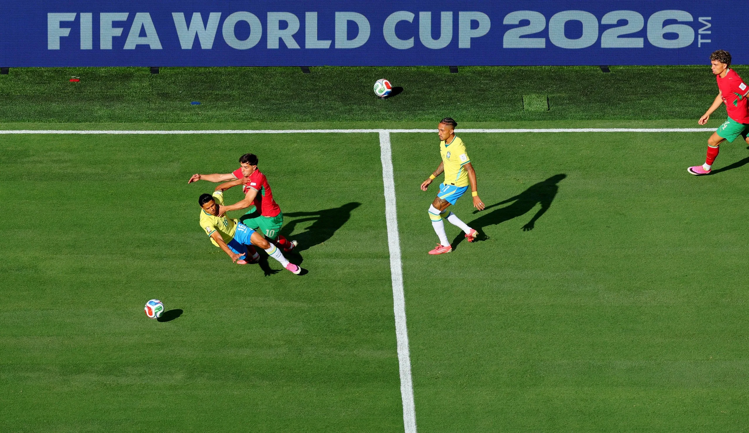 Brazil's Douglas Santos in action with Morocco's Brahim Diaz.