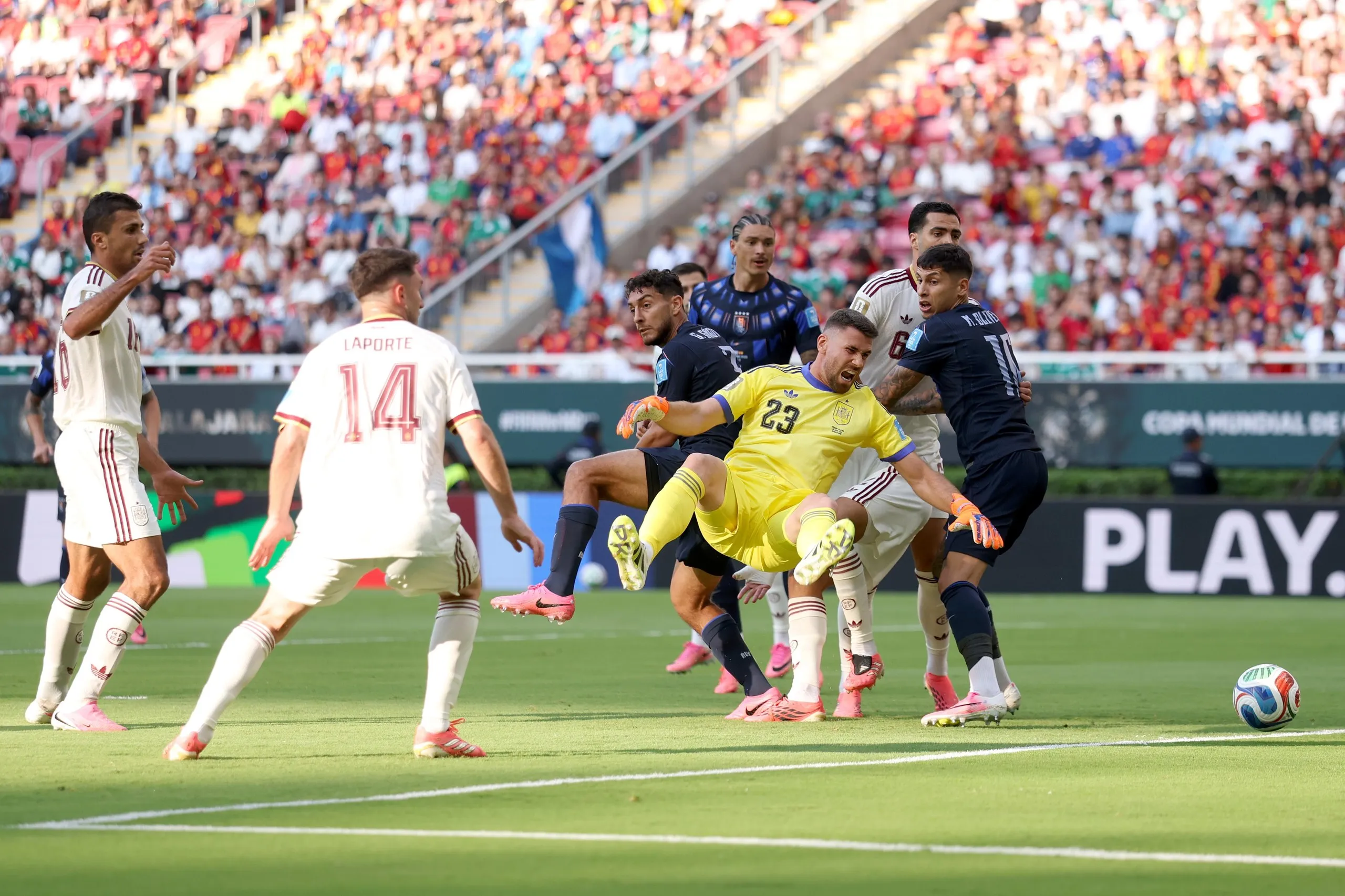 Unai Simon drops the cross in the box but Spain escape.