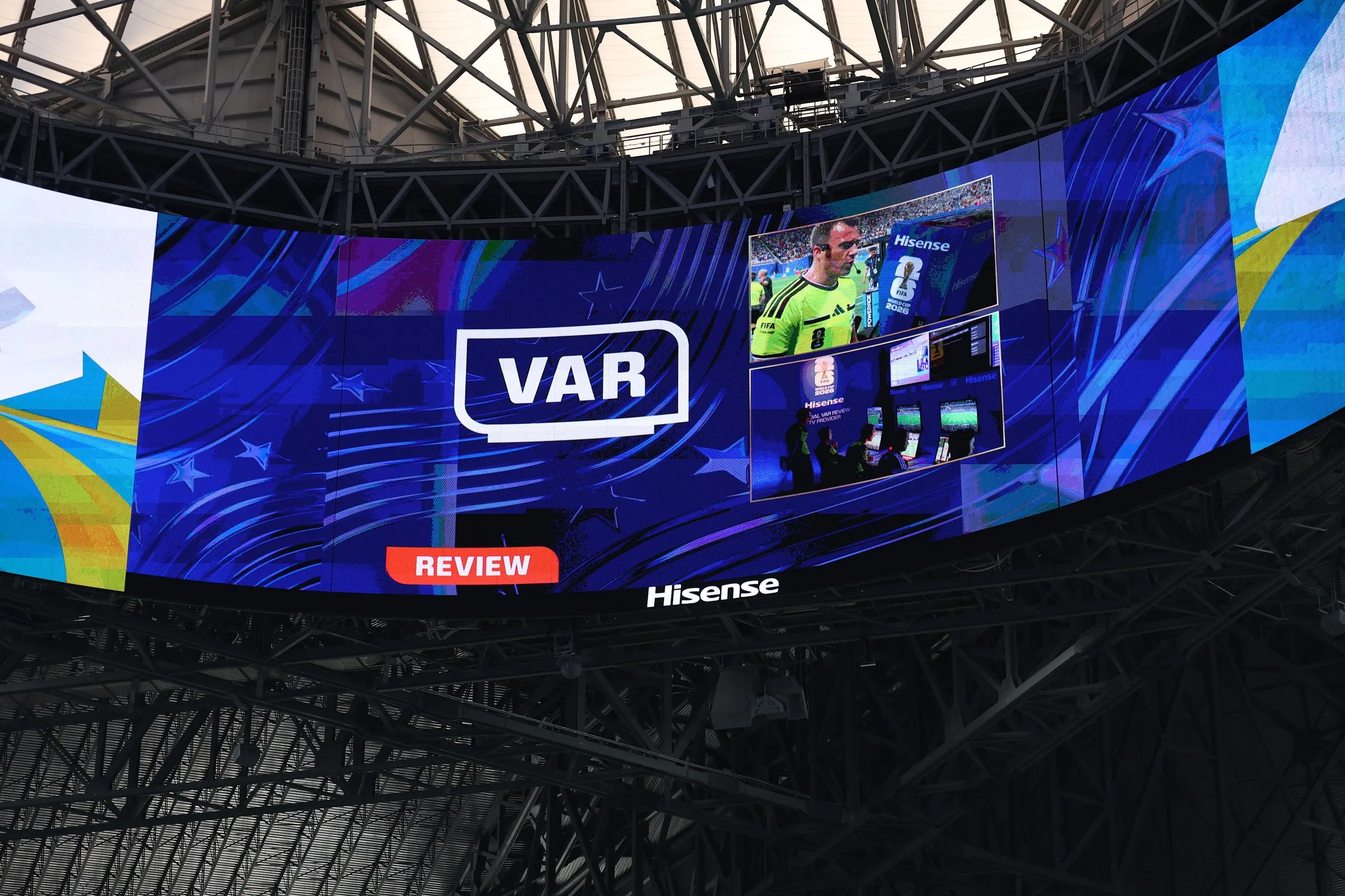 A general view as the screen shows a VAR review on the goal by Nathanael Mbuku