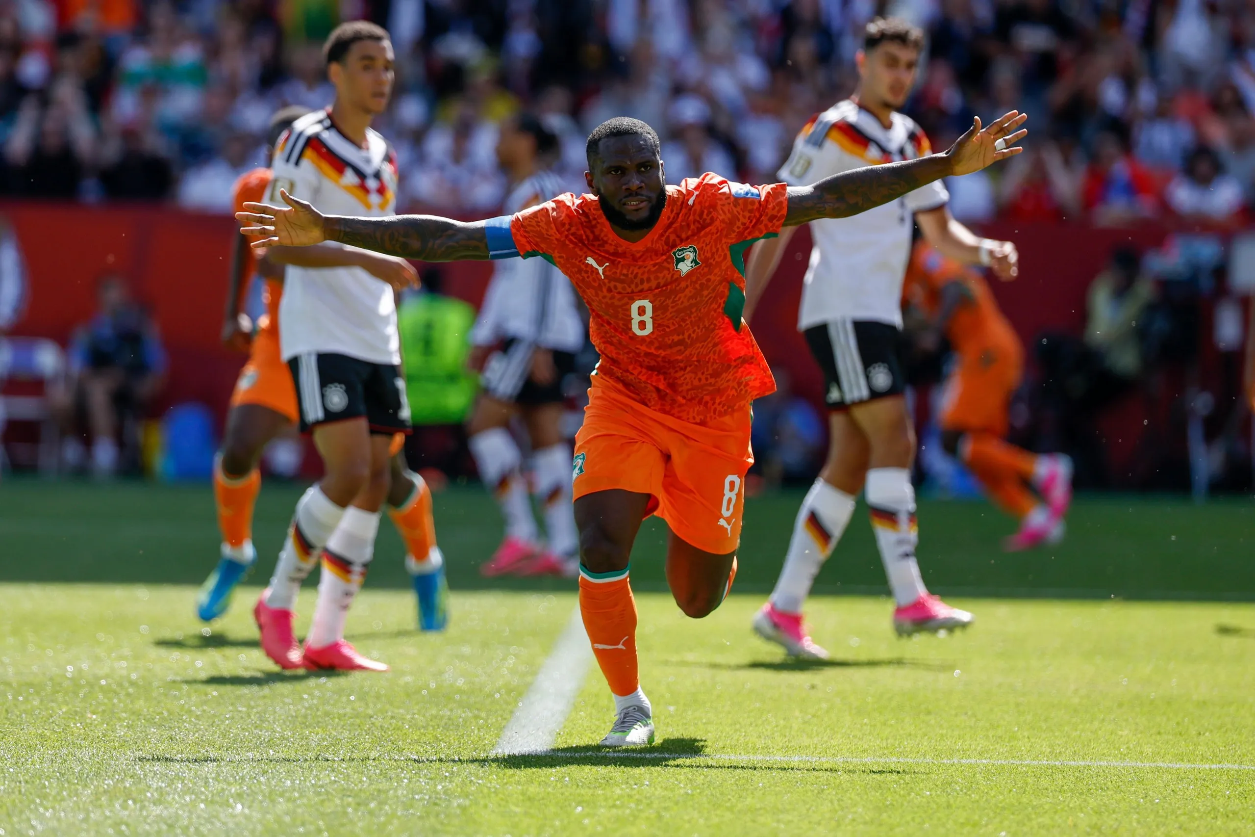 Franck Kessié celebrates after scoring for Côte d’Ivorie against Germany.