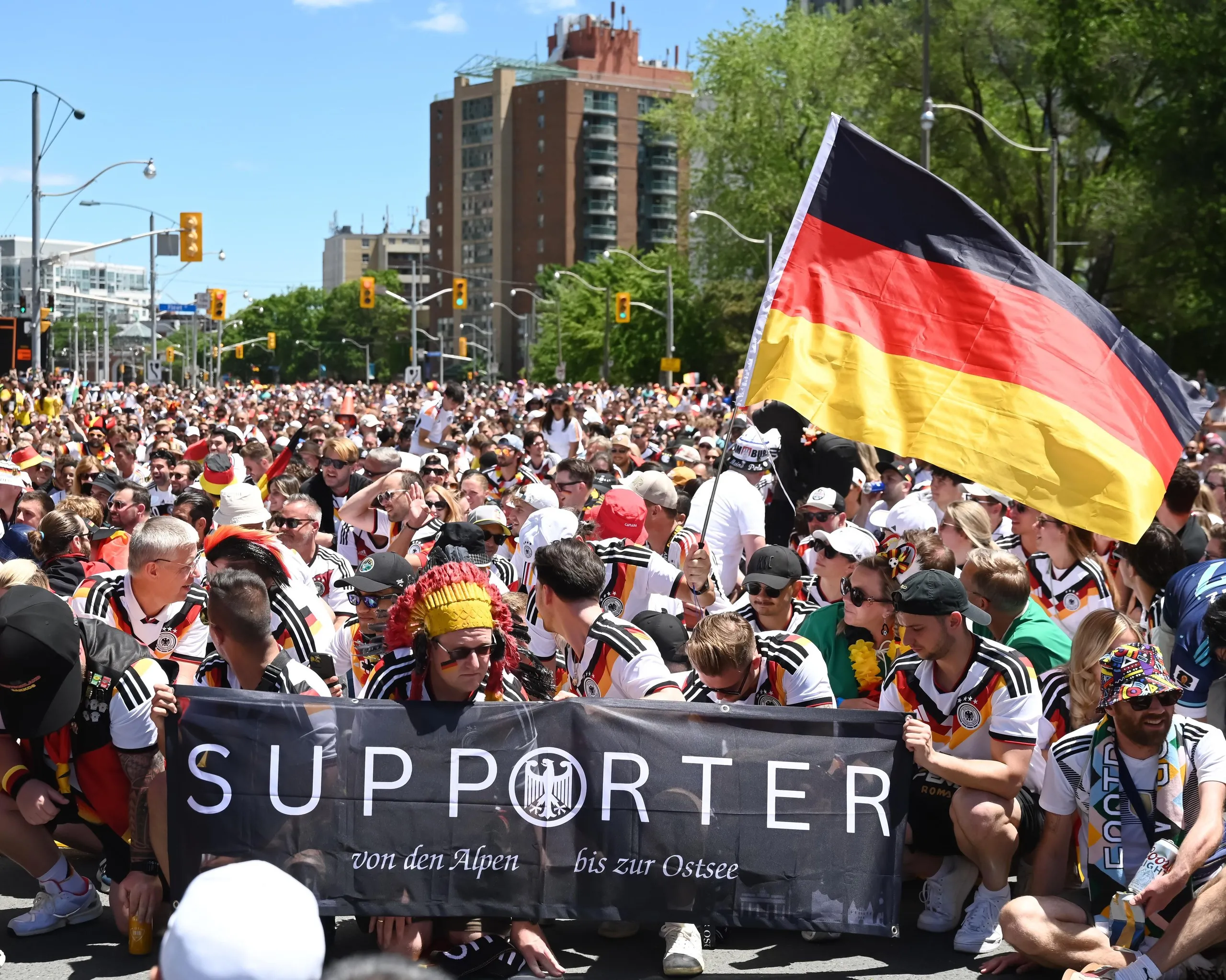 Germany fans march towards the stadium.