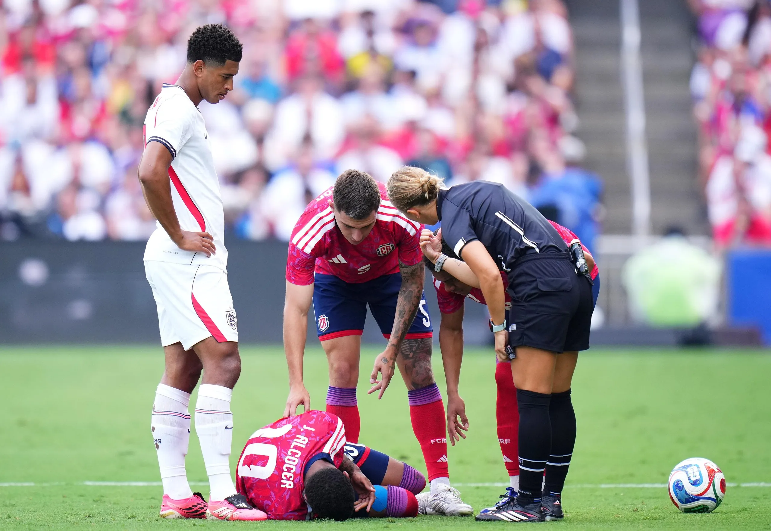 Josimar Alcocer of Costa Rica goes after clashing with James.