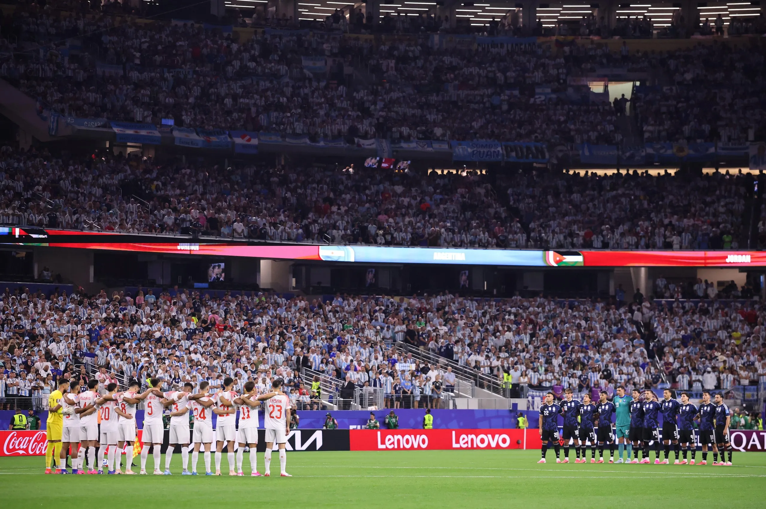 Players and match officials take a moment of silence for the victims of the Venezuelan earthquake