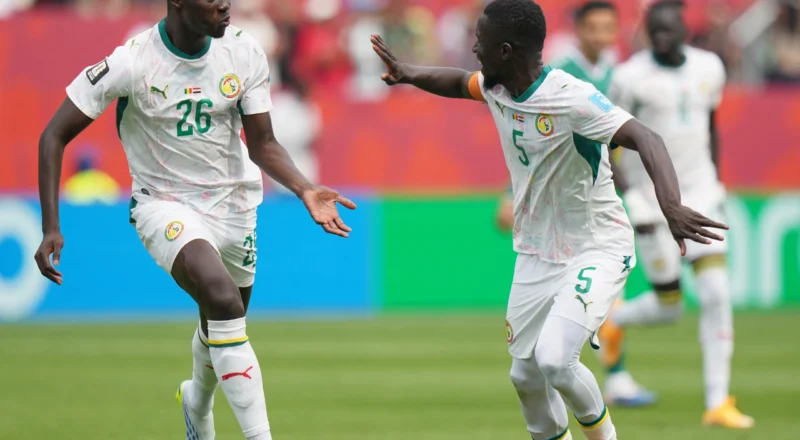 Senegal salvage hopes of World Cup last-32 place with rout of 10-man Iraq