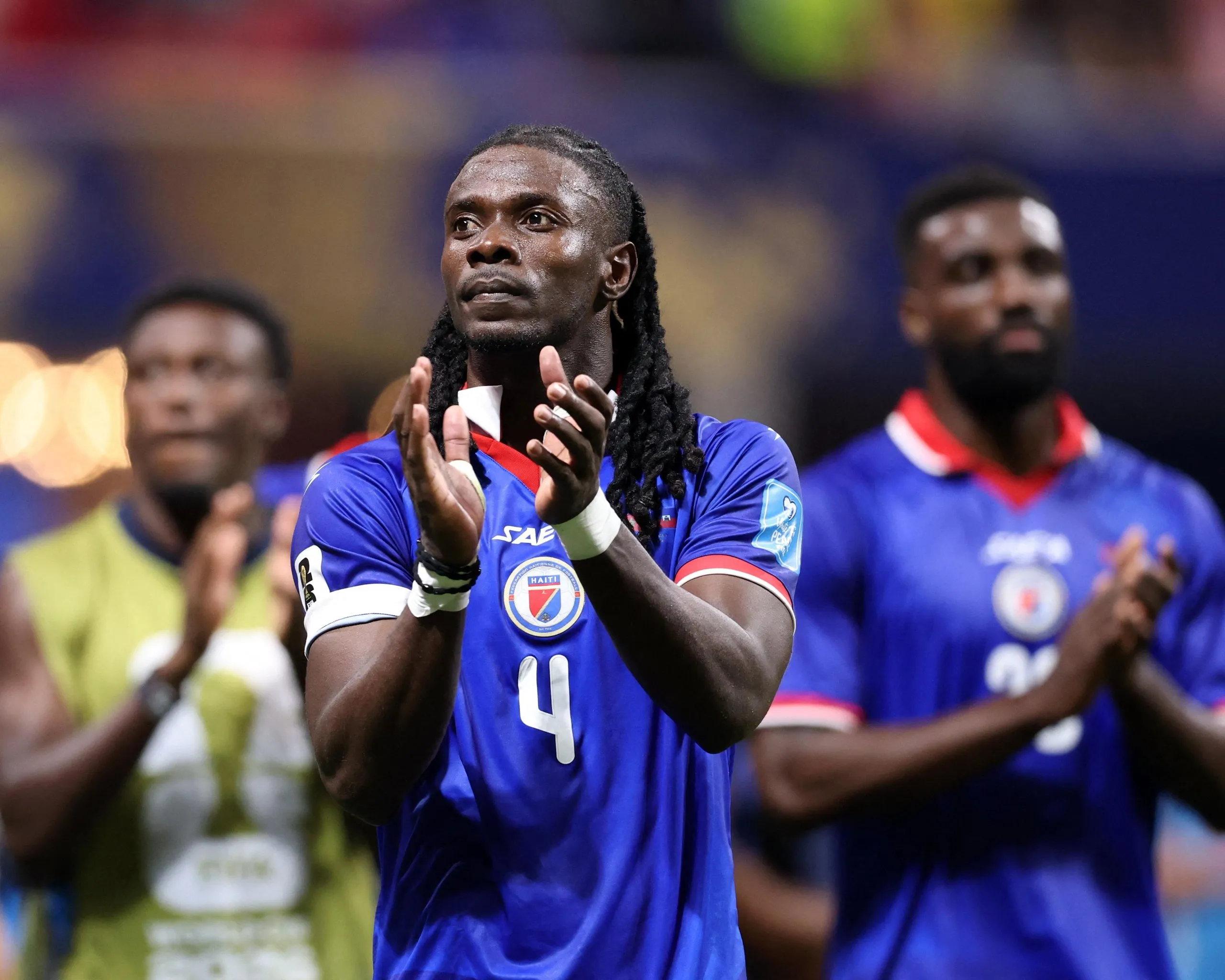 Haiti players applaud their fans.