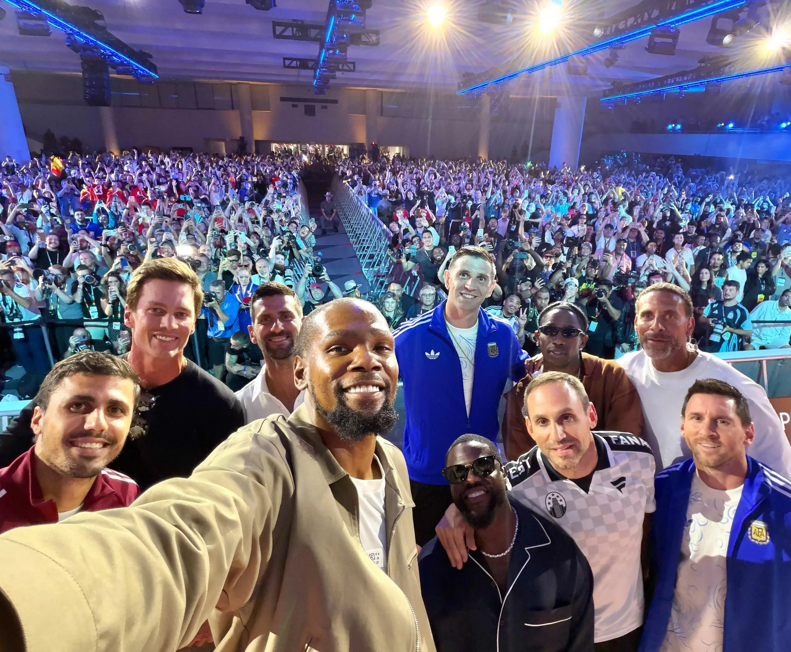 Famous athletes and celebrities take a selfie.
