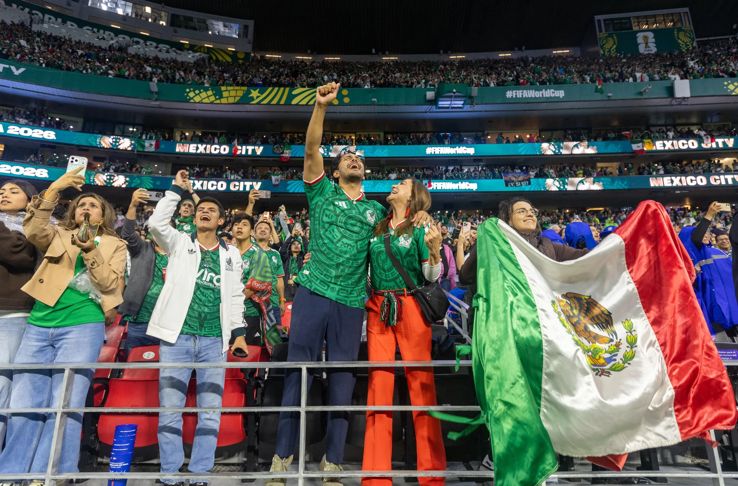 Fans of Mexico cheer at the Azteca Stadium after the win over Ecuador